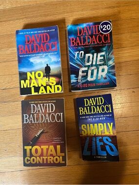 7 David Baldacci Books - $15